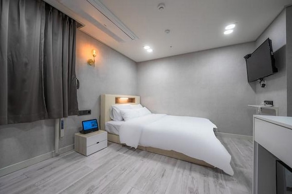 Standard Double Room, City View | Premium bedding, free minibar items, laptop workspace, blackout curtains