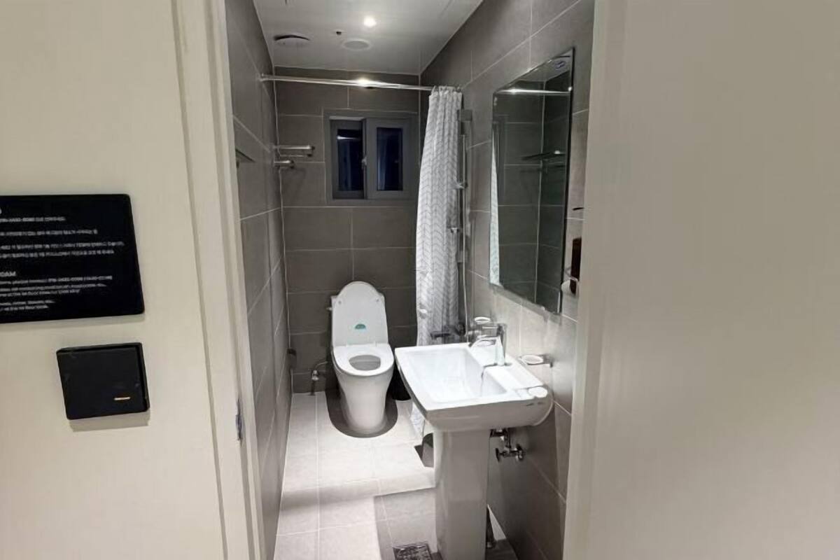 Bathroom | Shower, rainfall showerhead, designer toiletries, hair dryer