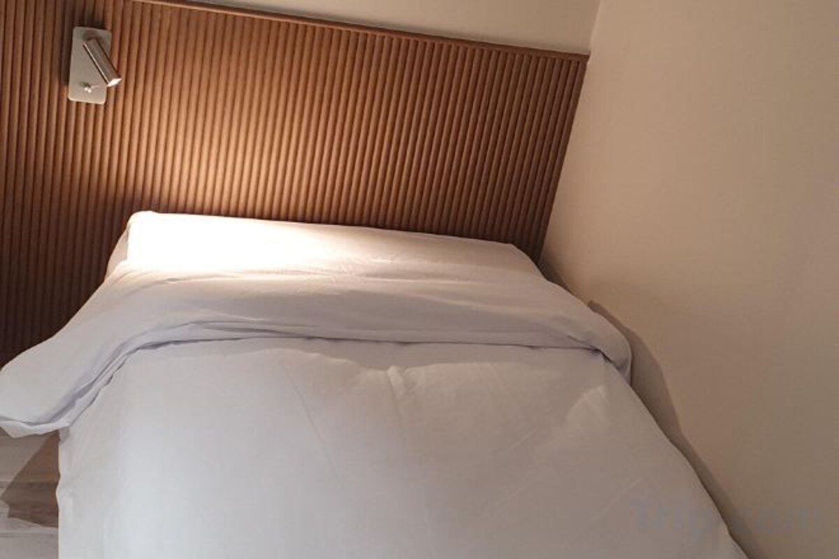 Premium bedding, minibar (some free items), blackout drapes