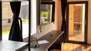 Bungalow Deluxe, vista al resort | Área de sala de estar