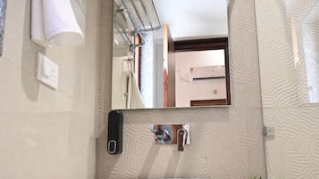 Hair dryer, towels, soap, shampoo