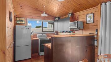 Fridge, microwave, toaster, cookware/dishes/utensils