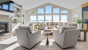 Living area - Spacious home w full Kachemak Bay views (Homer)