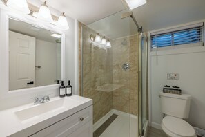 Shower, hair dryer, towels, soap