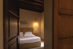 Premium bedding, down comforters, pillowtop beds, in-room safe