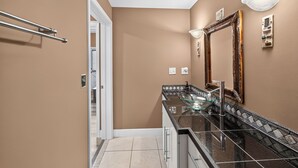 A bathroom with a glass bowl sink, a large mirror, and a towel rack. - Shepherd's Sky View | Secluded | MTN Views | Pool Table | (Morganton)