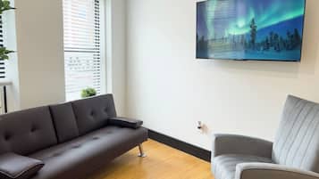32-inch flat-screen TV with cable channels