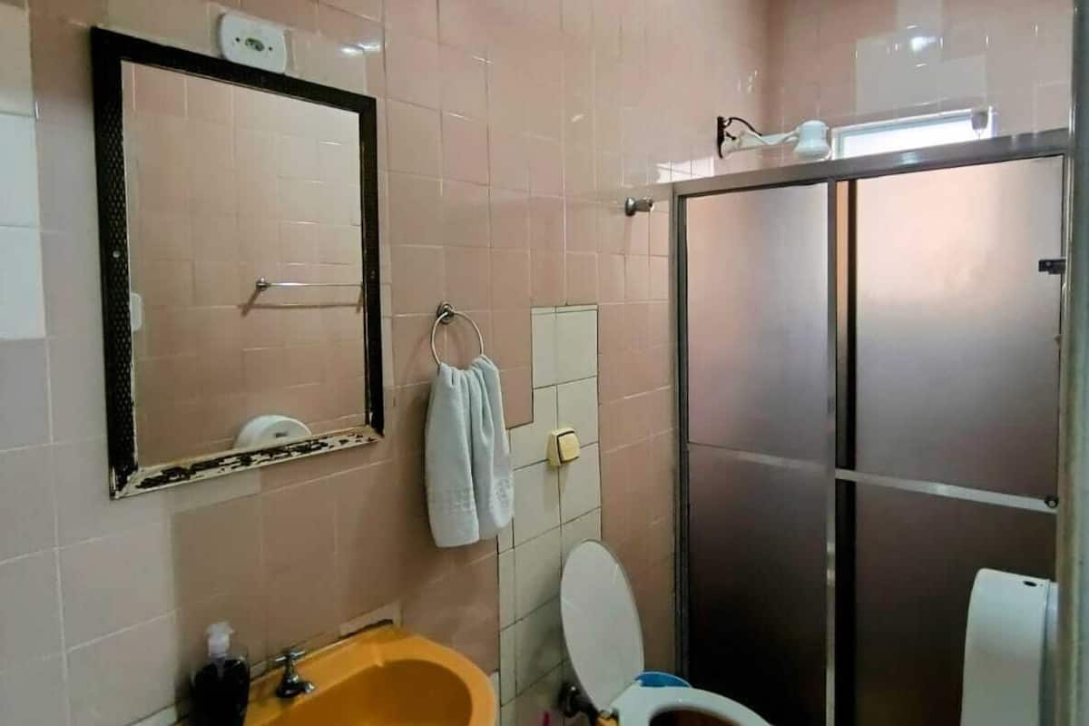 Shower, towels, soap, toilet paper