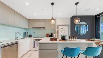 Coffee/tea maker, fridge, microwave, oven