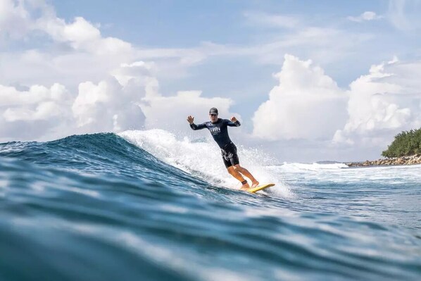 A person surfing on a wave.