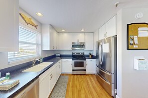 Fridge, microwave, dishwasher, coffee/tea maker