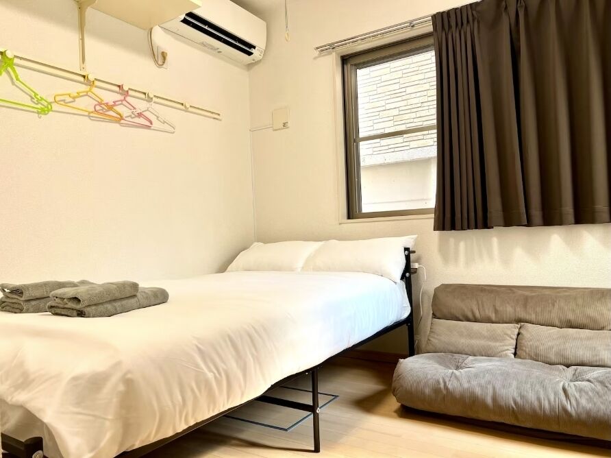 Hypo-allergenic bedding, down duvets, desk, laptop workspace