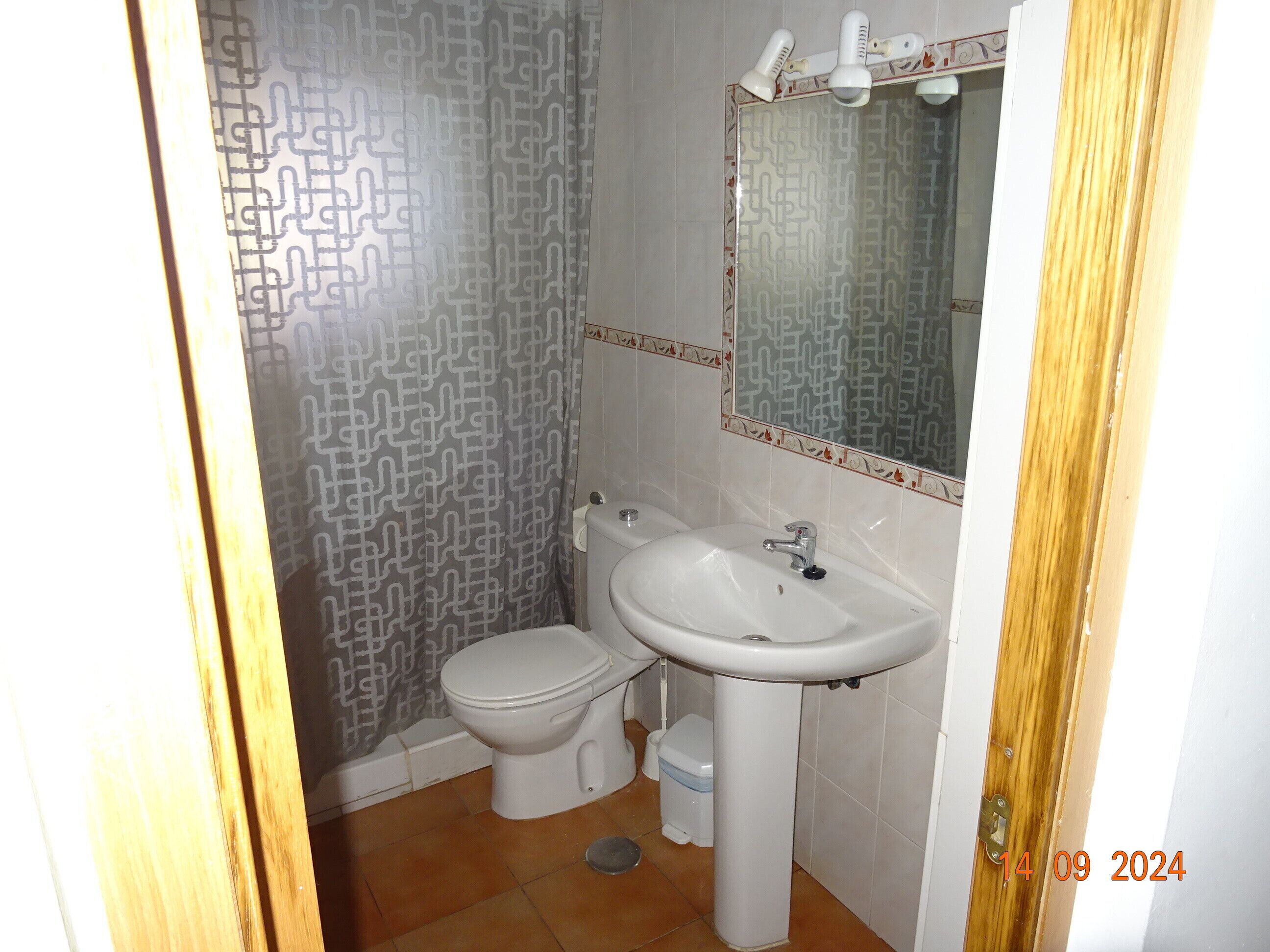 Doccia, asciugacapelli, asciugamani, sapone