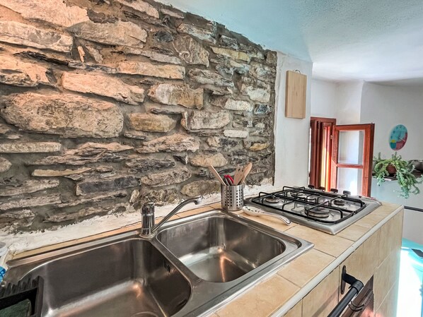 Fridge, microwave, cookware/dishes/utensils