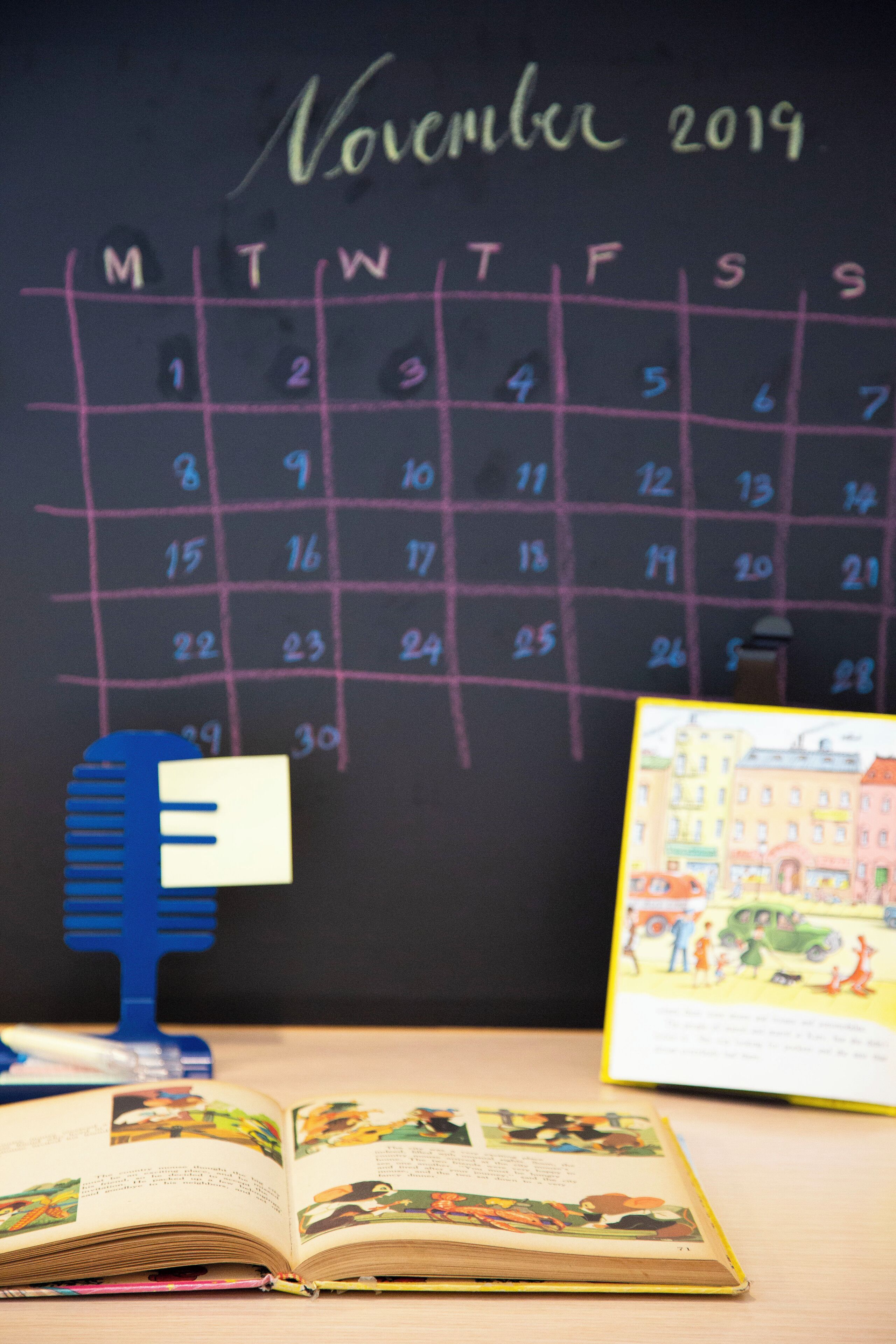 A calendar on a wall with the month November 2019.