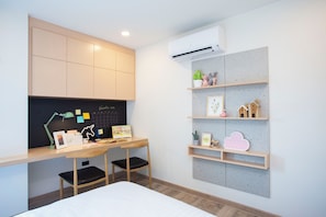 Apartamento família, sacada, vista para a cidade | 2 quartos, escrivaninha, espaço de trabalho para notebook