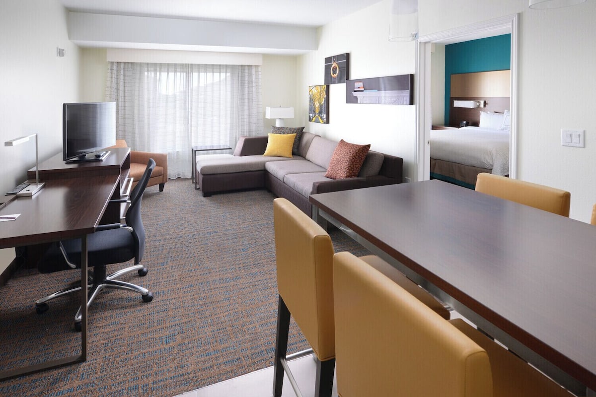 Suite, 1 Bedroom, Non Smoking, City View | Desk, laptop workspace, blackout drapes, iron/ironing board