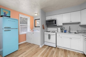 Fridge, microwave, oven, coffee/tea maker - Stylish South City King 1BR Apt (St. Louis)