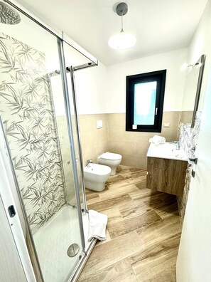 Hair dryer, towels, soap, shampoo