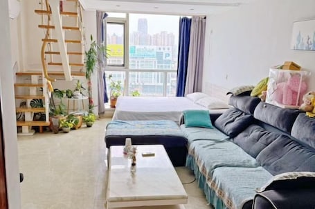 Room. Kaixuan Shidai Family Apartment