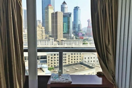 Kaixuan Shidai Family Apartment