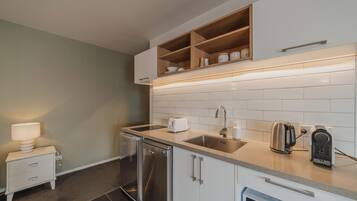 Microwave, stovetop, dishwasher, coffee/tea maker