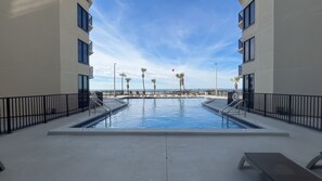 Outdoor pool, a heated pool - Sunbird Resort - 5th Floor - 3 Pools, Oceanfront - by Sunbird Rentals (Panama City Beach)
