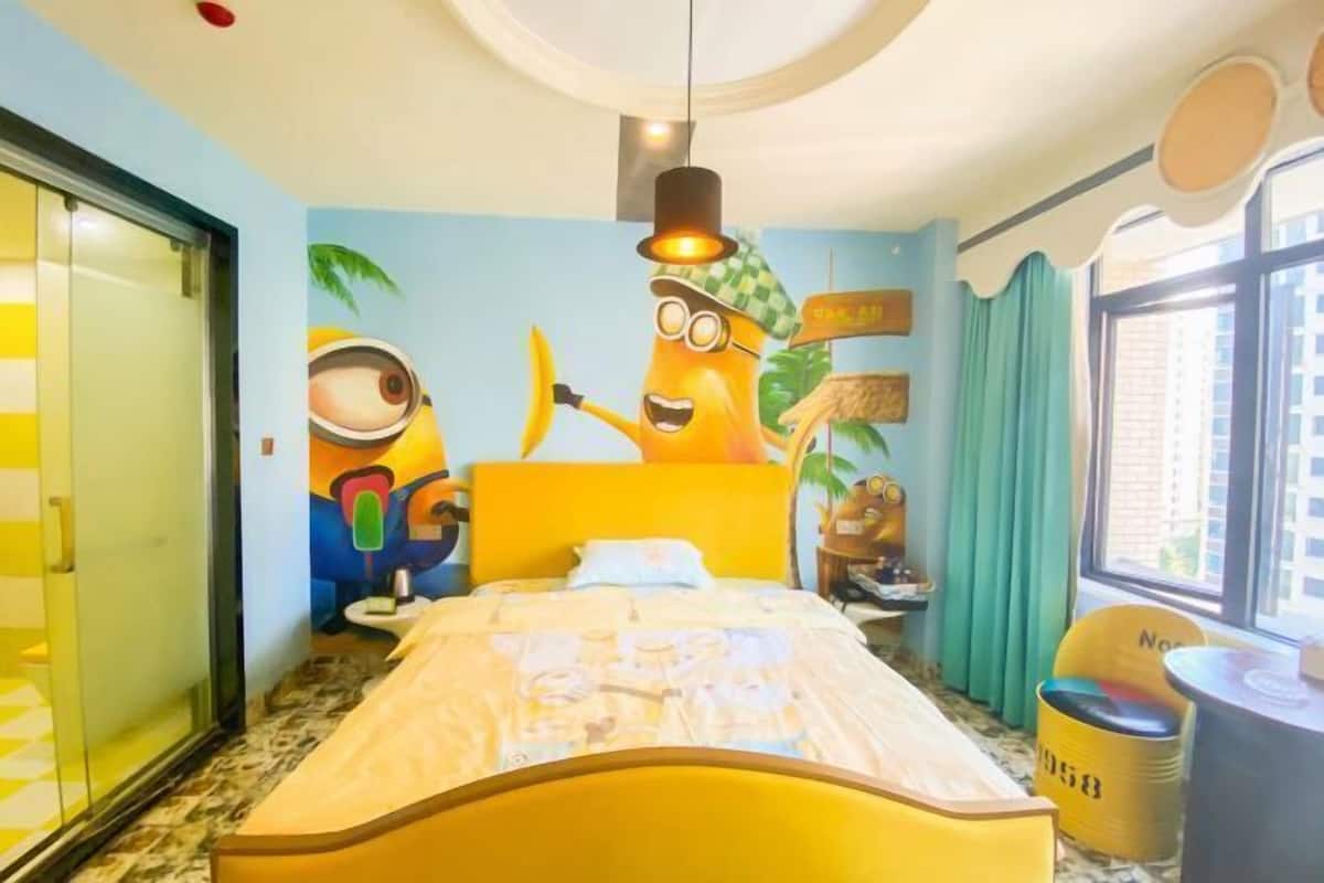 A room with a bed, a wall mural, a window, and a chair.