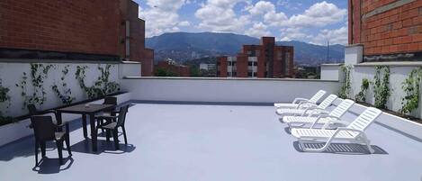 Căn hộ Deluxe, quang cảnh sân vườn | Hiên