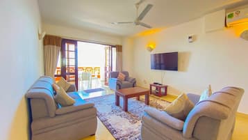 Appartement Luxe, vue plage | Coin séjour