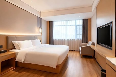 Room. Dilang Holiday Hotel (Yangzhou Jiangdu Passenger Terminal Branch)