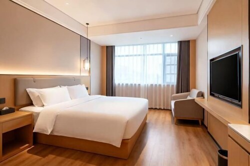 Dilang Holiday Hotel (Yangzhou Jiangdu Passenger Terminal Branch)