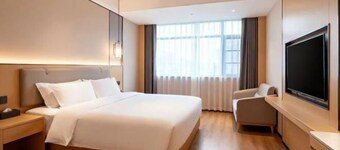 Dilang Holiday Hotel (Yangzhou Jiangdu Passenger Terminal Branch)