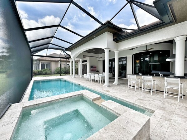 Outdoor pool, a heated pool - Upscale/Newly Renovated, 4 bed, heated pool, in Majors w/ Player's Club access (Naples)