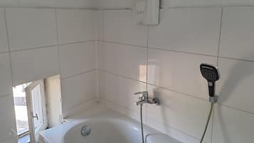 Hair dryer, towels, soap, shampoo