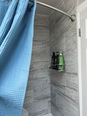 Hair dryer, towels, soap, shampoo