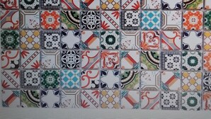 A computer screen displaying a webpage with a grid of various tile patterns.