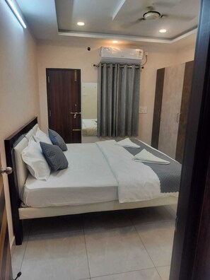 Deluxe Double Room, City View | Desk - NC Homestays (Tirupati)