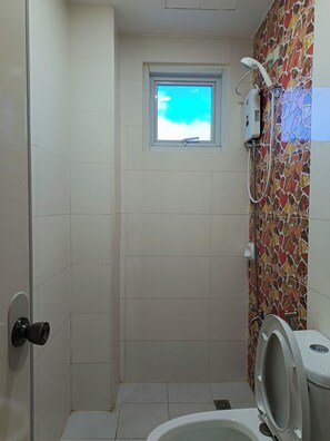 Shower, bidet, towels, soap