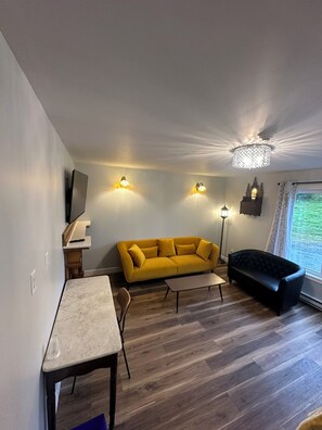 Deluxe Studio Suite | Living area | Smart TV