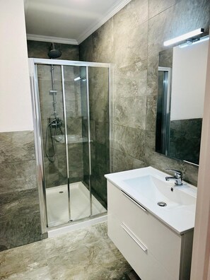 Bidet, towels, soap, shampoo