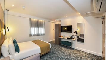 In-room safe, desk, laptop workspace, iron/ironing board