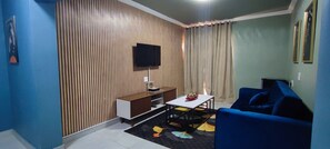 Superior Studio Suite, Courtyard View | Living area | 42-inch flat-screen TV with cable channels