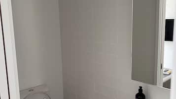 Comfort resortwoning | Badkamer | Badjassen