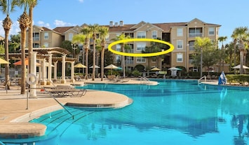 Relax and unwind with a stunning pool view from our third-floor condo at Windsor