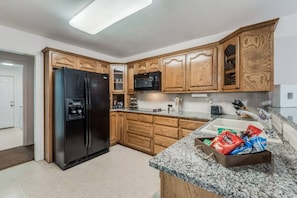 Dishwasher, toaster, cookware/dishes/utensils, dining tables