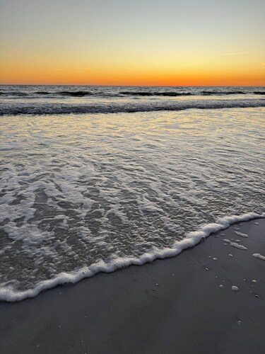 Beachfront condo located on 10 acres of pristine beach. Estero Beach Tennis B208