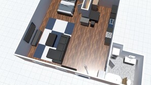 Een driedimensionale plattegrond van een hotelkamer met een bed, een bank, een eettafel en een kleine kitchenette.