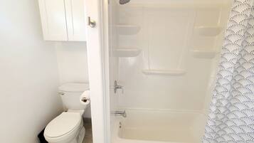 Hair dryer, towels, soap, toilet paper