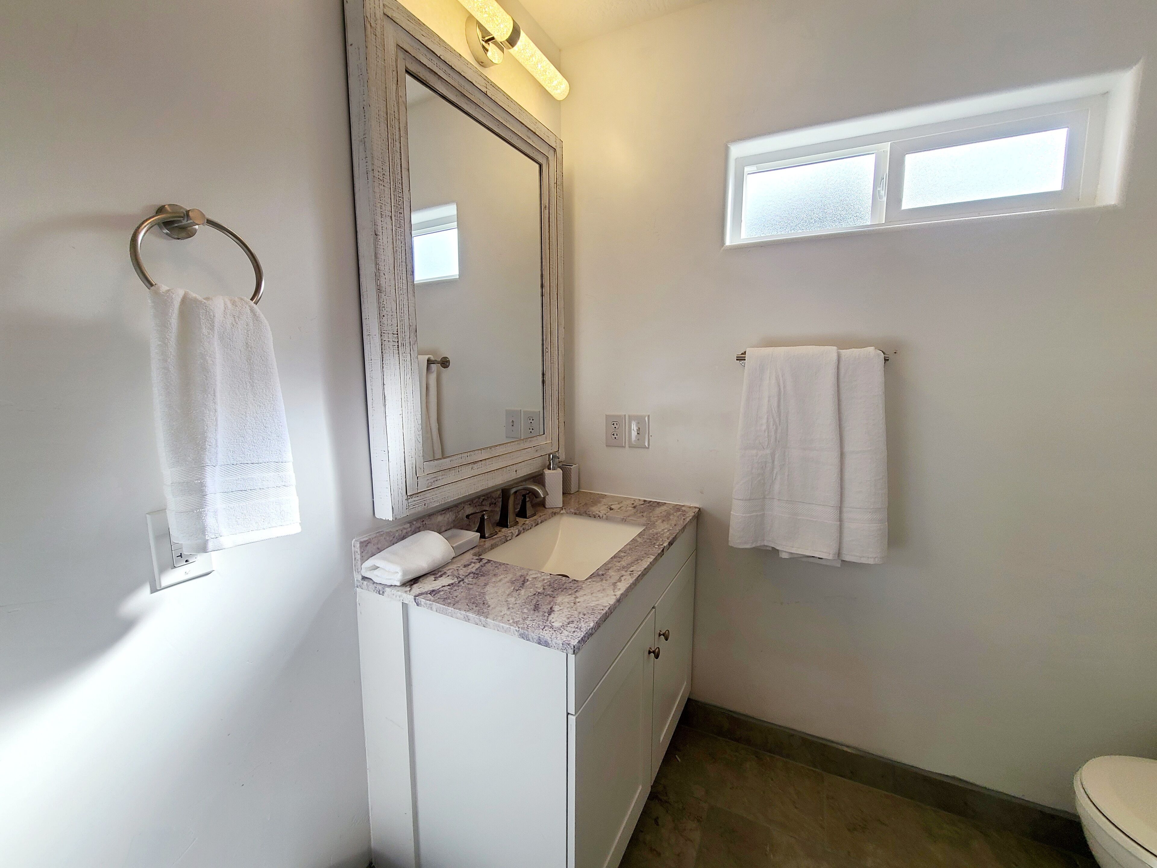 Hair dryer, towels, soap, toilet paper